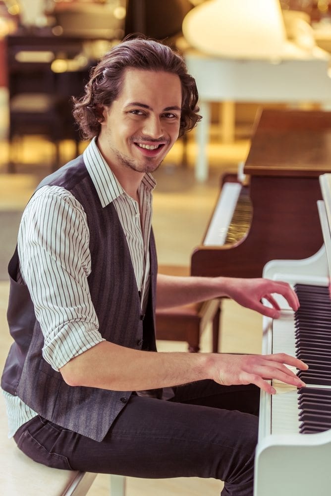 Adult man playing the piano