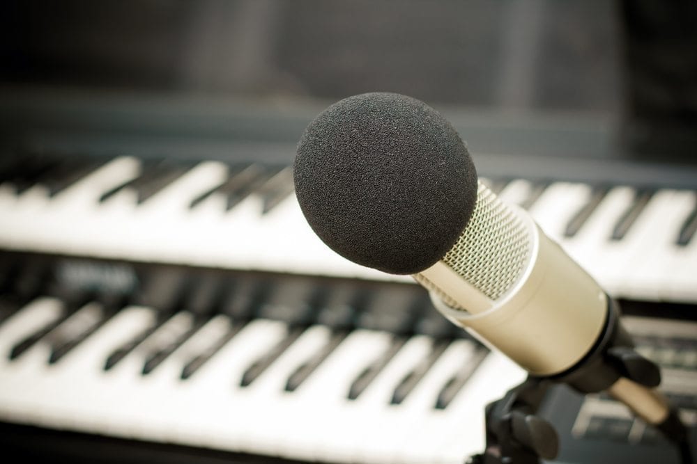 Microphone in front of digital piano