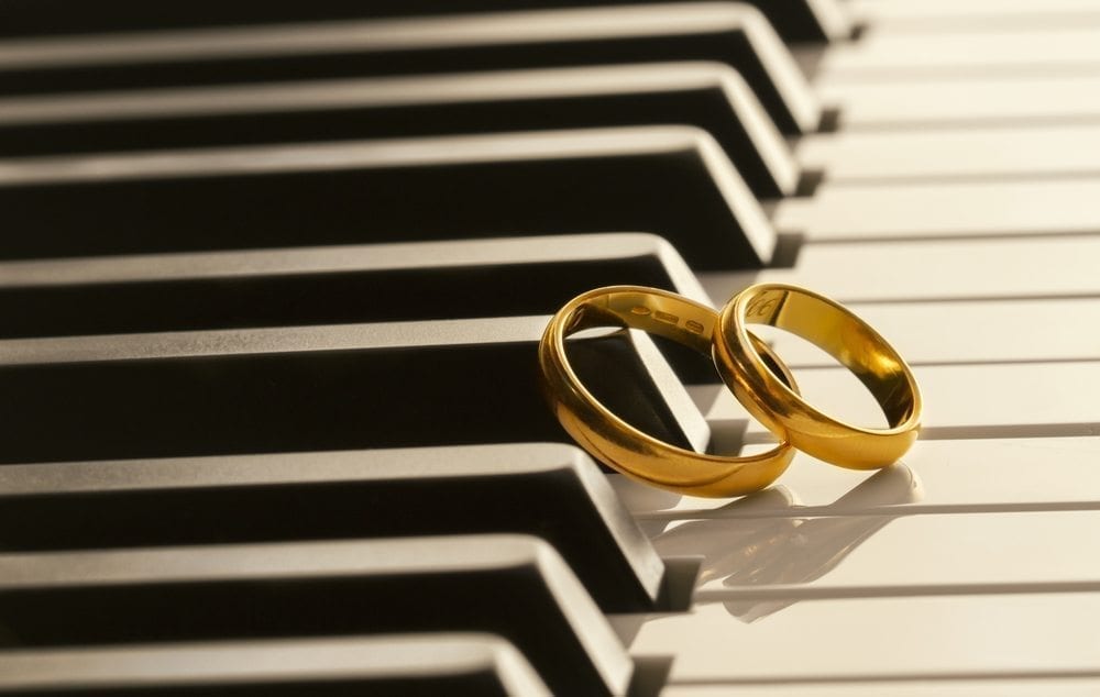 Wedding rings on piano